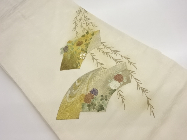 金彩螺鈿地紙に草花・流水模様名古屋帯